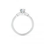 A classic engagement ring beautifully set with a round brilliant cut diamond & tapered baguettes